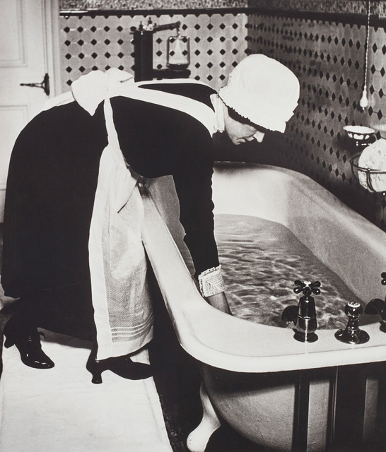 Bill Brandt, ‘Parlourmaid preparing a bath before dinner, London’, 1939, Phillips