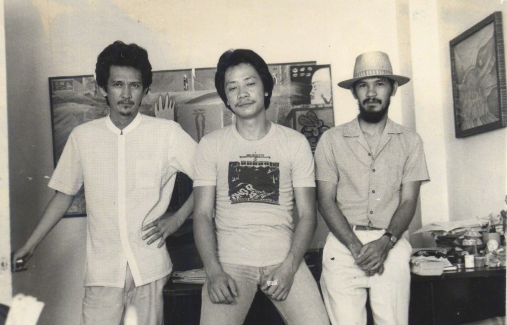 Image: (left to right) Black Artists in Asia core members Nunelucio "Nune" Alvarado, Charlie Co, Norberto "Peewee" Roldan. Taken at Alvarado's studio in Bacolod circa 1983.
Courtesy of Green Papaya Art Projects. Image: (left to right) Black Artists in Asia core members Nunelucio "Nune" Alvarado, Charlie Co, Norberto "Peewee" Roldan. Taken at Alvarado's studio in Bacolod circa 1983.
Courtesy of Green Papaya Art Projects.