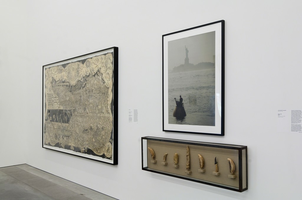 (L to R) Installation view of "Duke Riley’s Curtains for the Free World" (2007), "Photograph of Duke Riley in The Acorn Submarine" (2007), and "Items Salvaged from Vessel: Whale’s teeth believed to have been engraved by Gordon David while inside The Acorn vessel" (2007) as part of special exhibition "Radical Seafaring" on view at the Parrish Art Museum, Water Mill, New York, May 8 – July 24, 2016. Photo: Gary Mamay (L to R) Installation view of "Duke Riley’s Curtains for the Free World" (2007), "Photograph of Duke Riley in The Acorn Submarine" (2007), and "Items Salvaged from Vessel: Whale’s teeth believed to have been engraved by Gordon David while inside The Acorn vessel" (2007) as part of special exhibition "Radical Seafaring" on view at the Parrish Art Museum, Water Mill, New York, May 8 – July 24, 2016. Photo: Gary Mamay