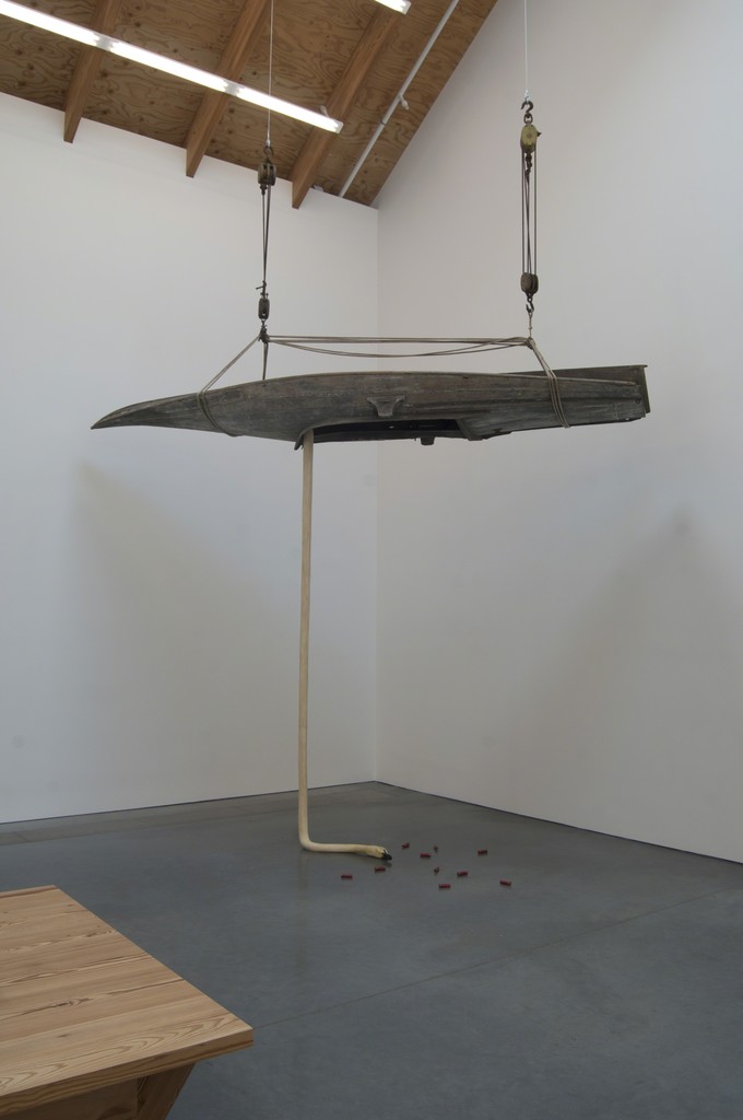 Installation view of Michael Combs (born, 1970), "Spent Cases," 1998. Mixed media with carved and painted cedar and 1890's gunning skiff, 135 x 168 x 54 inches. Parrish Art Museum, Water Mill, New York, Museum purchase with funds provided by Alexander M. Guest, Beth Rudin DeWoody, Joanne Cassullo, and partial gift of the artist and Salomon Contemporary, New York. Installation view of Michael Combs (born, 1970), "Spent Cases," 1998. Mixed media with carved and painted cedar and 1890's gunning skiff, 135 x 168 x 54 inches. Parrish Art Museum, Water Mill, New York, Museum purchase with funds provided by Alexander M. Guest, Beth Rudin DeWoody, Joanne Cassullo, and partial gift of the artist and Salomon Contemporary, New York.