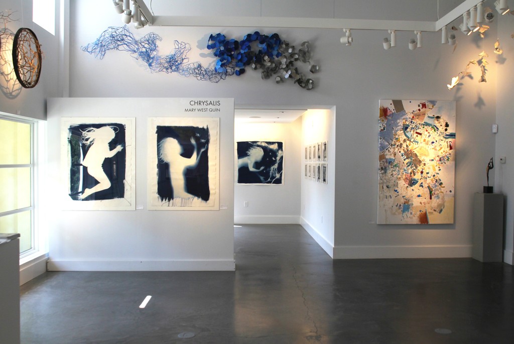 Left to Right:
Chrysalis Exhibition: "Impression", Mary West Quin, Cyanotype, 32" x 44"
"Chrysalis Study II", Mary West Quin, Cyanotype, 32" x 44"
"Chrysalis Study I", Mary West Quin, Cyanotype, 42" x 44"
Imaginary Mindscapes Exhibition: "En Fabis Piecha", Philippe Halaburda, Acrylic, Felt Tip and Colored Pencil on Canvas, 75" x 47"
Paper Wall Sculpture by Barbara Owen Left to Right:
Chrysalis Exhibition: "Impression", Mary West Quin, Cyanotype, 32" x 44"
"Chrysalis Study II", Mary West Quin, Cyanotype, 32" x 44"
"Chrysalis Study I", Mary West Quin, Cyanotype, 42" x 44"
Imaginary Mindscapes Exhibition: "En Fabis Piecha", Philippe Halaburda, Acrylic, Felt Tip and Colored Pencil on Canvas, 75" x 47"
Paper Wall Sculpture by Barbara Owen