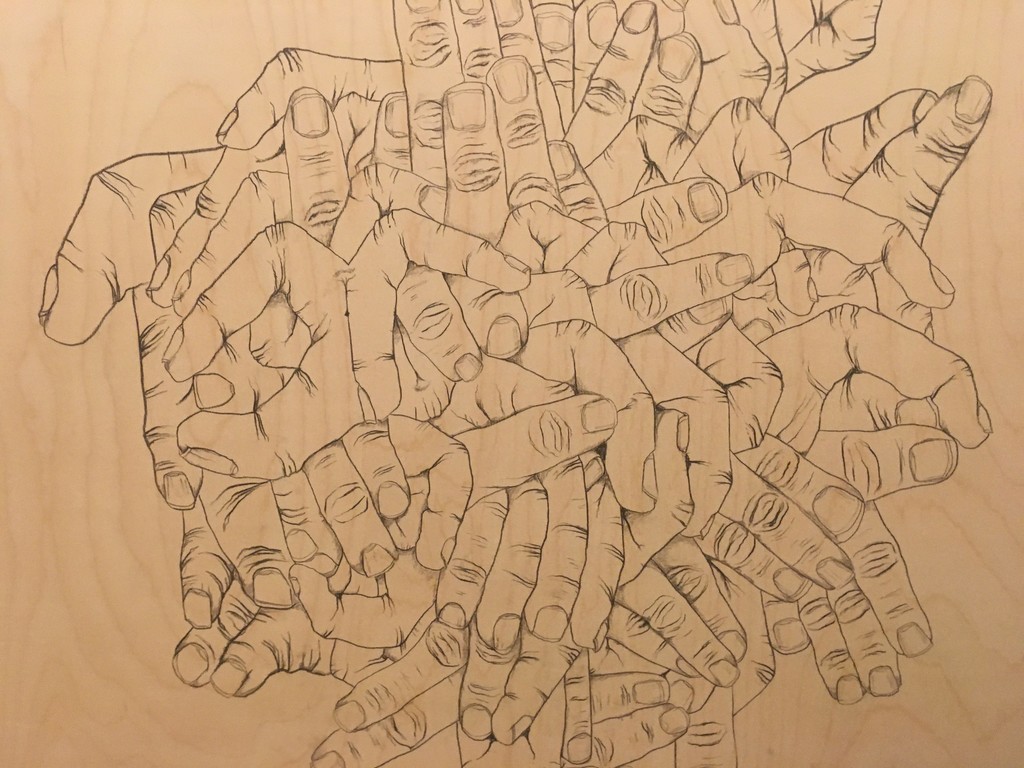 "Fingers Crossed" (detail) by Brian Mallman, 2017, graphite on wood panel "Fingers Crossed" (detail) by Brian Mallman, 2017, graphite on wood panel
