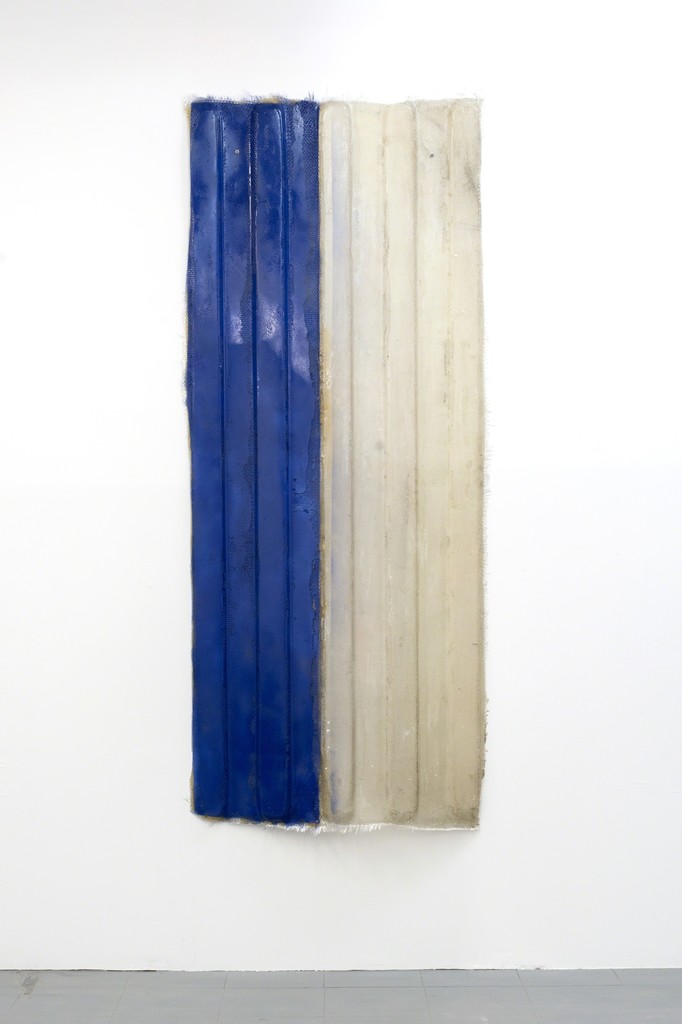 A cast resin wall sculpture by James Powers. A cast resin wall sculpture by James Powers.