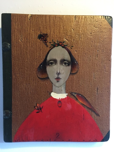 Lady with grapes in red