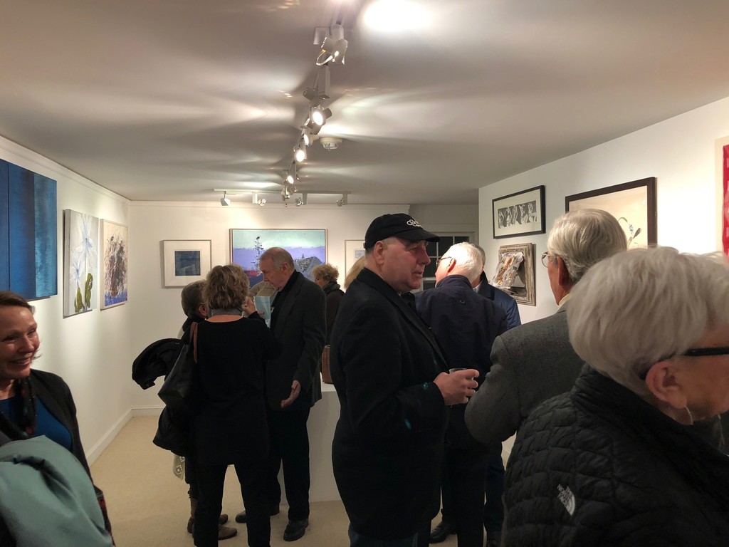 Patrons, friends and artists enjoy the opening reception on December 1st. Patrons, friends and artists enjoy the opening reception on December 1st.