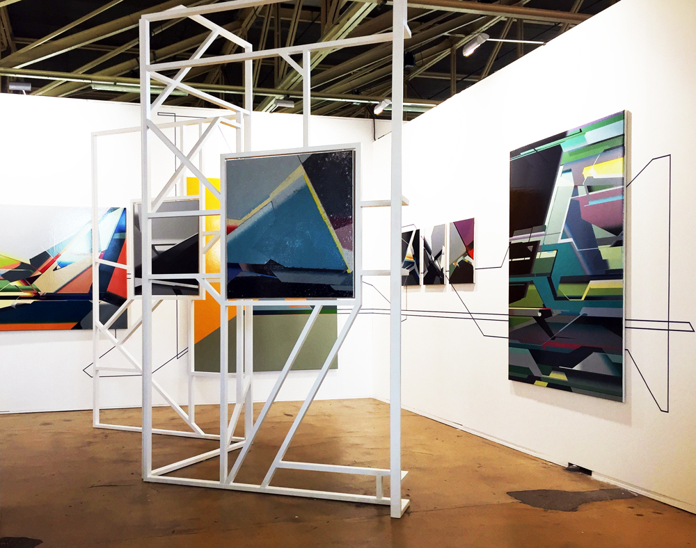 View into the booth. A joint venture, a 'Gesamtkunstwerk' of the artist's paintings, collages and installation; photo: gallery View into the booth. A joint venture, a 'Gesamtkunstwerk' of the artist's paintings, collages and installation; photo: gallery