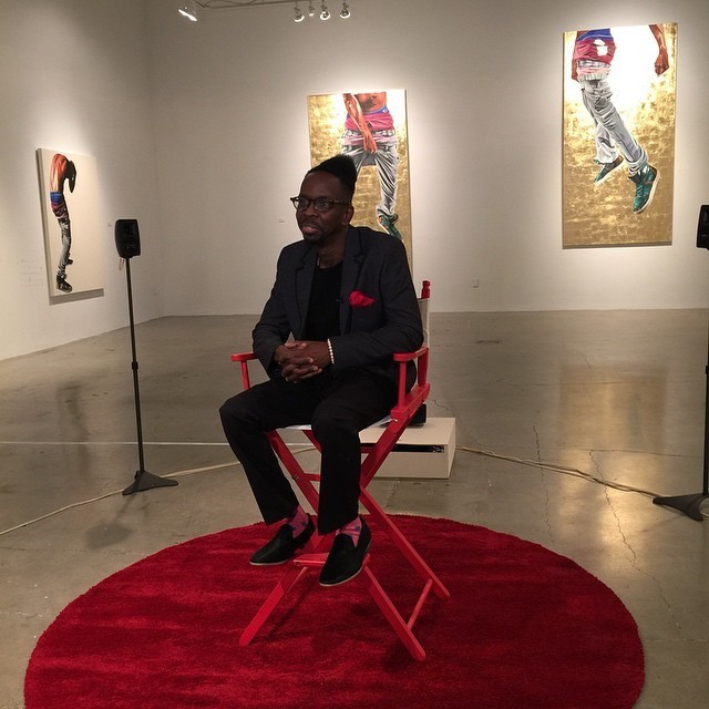 Artist Fahamu Pecou (seated) "GRAV-I-TY" installation at the Museum of Contemporary Art of Georgia (MOCAGA), Atlanta, GA Artist Fahamu Pecou (seated) "GRAV-I-TY" installation at the Museum of Contemporary Art of Georgia (MOCAGA), Atlanta, GA