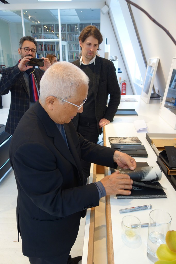 Kikuji Kawada signing original copies of The Map at the opening of "The Last Cosmology" here at Michael Hoppen Gallery Kikuji Kawada signing original copies of The Map at the opening of "The Last Cosmology" here at Michael Hoppen Gallery
