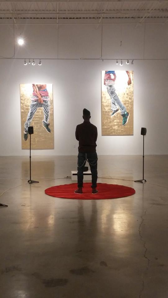 Artist Fahamu Pecou (standing) "GRAV-I-TY" installation at MOCAGA "Black Boy Fly" (left) and "But I'm Fly" (right) Artist Fahamu Pecou (standing) "GRAV-I-TY" installation at MOCAGA "Black Boy Fly" (left) and "But I'm Fly" (right)