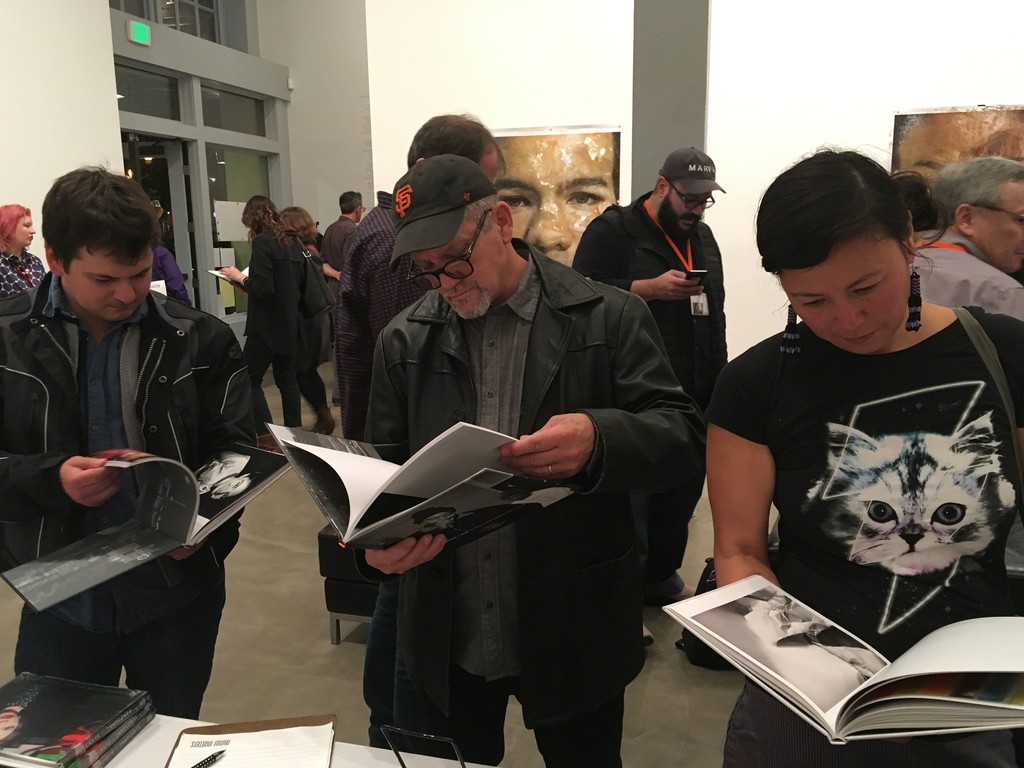 Visitors perusing Minor Matters titles, Portland, OR, 2017 Visitors perusing Minor Matters titles, Portland, OR, 2017