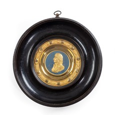 A commemorative medallion of Admiral Lord Nelson