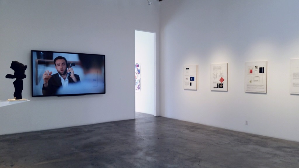 Installation view Ha Ha! Business!. Valerie Blass sculpture (far left), video monitor, Deb Sokolow drawings. Installation view Ha Ha! Business!. Valerie Blass sculpture (far left), video monitor, Deb Sokolow drawings.