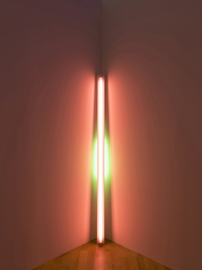 Dan Flavin, untitled, 1969. Pink and green fluorescent light. 8 ft. leaning into a corner with the top of the 20W tube touching the corner. Installation view: Dan Flavin: cornered fluorescent light, Mana Contemporary, Jersey City, 2018. Photo: John Berens. Courtesy of the Estate of Dan Flavin
Dan Flavin, untitled, 1969. Pink and green fluorescent light. 8 ft. leaning into a corner with the top of the 20W tube touching the corner. Installation view: Dan Flavin: cornered fluorescent light, Mana Contemporary, Jersey City, 2018. Photo: John Berens. Courtesy of the Estate of Dan Flavin