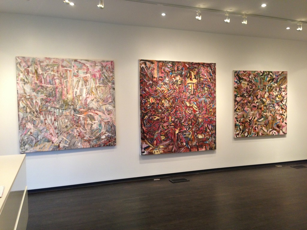 Three of Louise Smith's large collage covered canvases. The artist adds and subtracts paper, tickets, cardboard, tape etc along with her paints to develop a lively surface. Three of Louise Smith's large collage covered canvases. The artist adds and subtracts paper, tickets, cardboard, tape etc along with her paints to develop a lively surface.