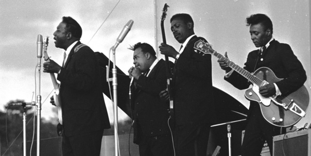 John 'Hoppy' Hopkins, ‘Muddy Waters, James Cotton, Jimmy Lee Morris and Peewee Madison, Newport Jazz Festival’, 1965, Photography, Hand-Printed Silver Gelatin print, ElliottHalls