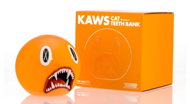 KAWS, ‘Cat Teeth Bank (Orange) in original box’, 2007, Sculpture, Painted cast vinyl; in original box., Alpha 137 Gallery Gallery Auction