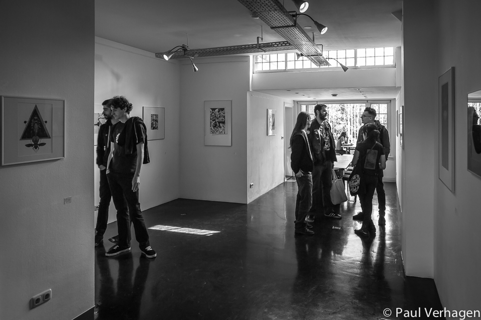 Installation overview with visitors during Roadburn Festival for the solo exhibition 'Brilliant Shadows' by Arik Roper. Installation overview with visitors during Roadburn Festival for the solo exhibition 'Brilliant Shadows' by Arik Roper.