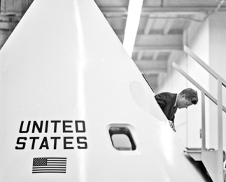 JFK inspects Saturn V rocket