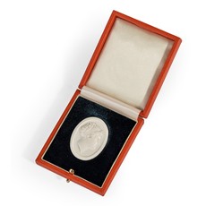 A white vitreous paste cameo of Emma, Lady Hamilton