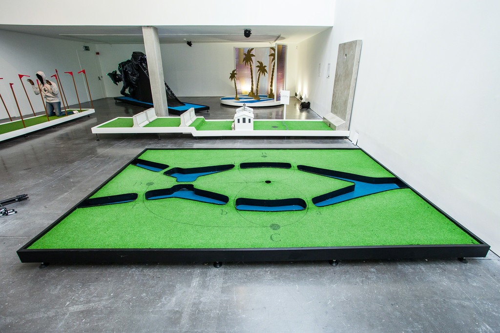 Installation view of "Doug Fishbone's Leisure Land Golf" at New Art Exchange, Nottingham (2016) Photo by Bartosz Kali Installation view of "Doug Fishbone's Leisure Land Golf" at New Art Exchange, Nottingham (2016) Photo by Bartosz Kali