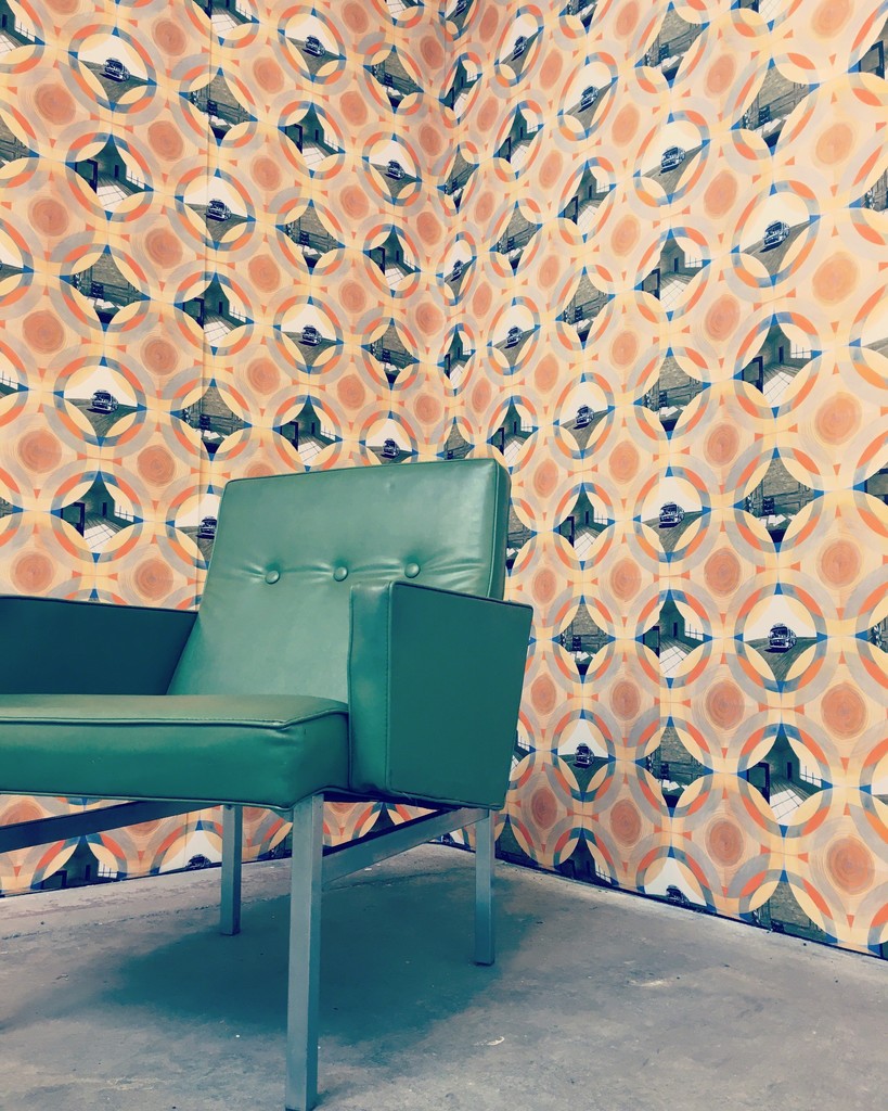 As part of the exhibition, "Prototype 1977" has been mocked up as actual wallpaper, complete with 1970s era furniture. As part of the exhibition, "Prototype 1977" has been mocked up as actual wallpaper, complete with 1970s era furniture.