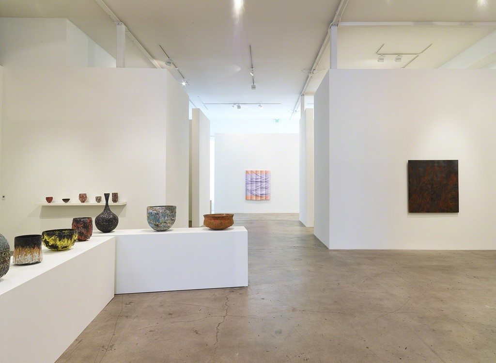 Installation view of "Transfigured." with (left) ceramics by Jay Kvapil, (center) paintings by Sarah Mikenis; (right) paintings by Lionel Sabatte´ Installation view of "Transfigured." with (left) ceramics by Jay Kvapil, (center) paintings by Sarah Mikenis; (right) paintings by Lionel Sabatte´