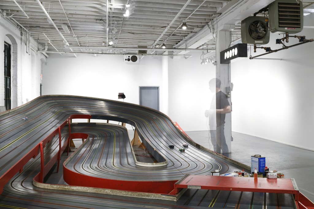 Artist and owner of PROTO Gallery Nick De Pirro, running a 1/24 scale slot car on the Ogilvie Hurricane track. Artist and owner of PROTO Gallery Nick De Pirro, running a 1/24 scale slot car on the Ogilvie Hurricane track.