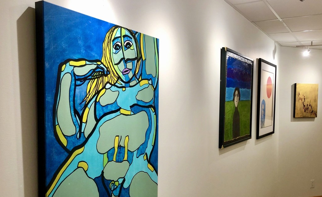 Left: "Under Water" by Portuguese artist Joaquim Lourenço. Further down the walk-around, from left to right: "Timeless", "Luna Roja" by San Francisco artist Martín Shulka, and "Voyage of Thoughts No. 3" by Swedish artist, Arngrim Larsen. Left: "Under Water" by Portuguese artist Joaquim Lourenço. Further down the walk-around, from left to right: "Timeless", "Luna Roja" by San Francisco artist Martín Shulka, and "Voyage of Thoughts No. 3" by Swedish artist, Arngrim Larsen.