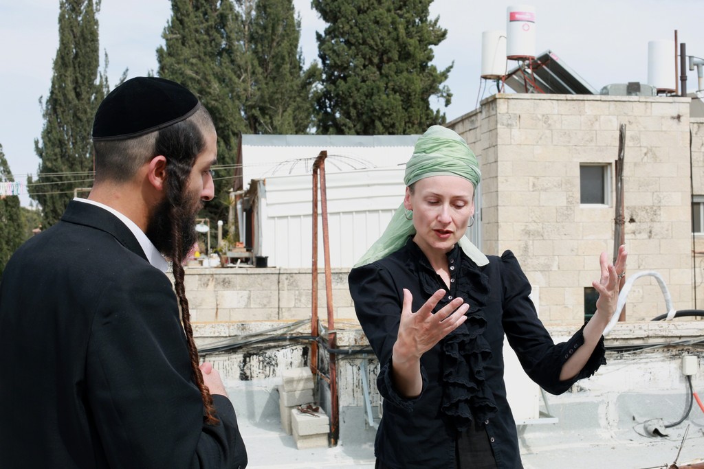 Isabel Rocamora in an essay of Faith in Jerusalem, photography by Shira Kela, 2015. Courtesy of the artist and Galeria SENDA. Isabel Rocamora in an essay of Faith in Jerusalem, photography by Shira Kela, 2015. Courtesy of the artist and Galeria SENDA.