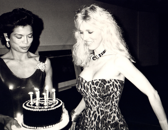 Andy Warhol, ‘Andy Warhol, Photograph of Bianca Jagger with cake on Alana Stewart's Birthday, 1985’, 1985, Hedges Projects