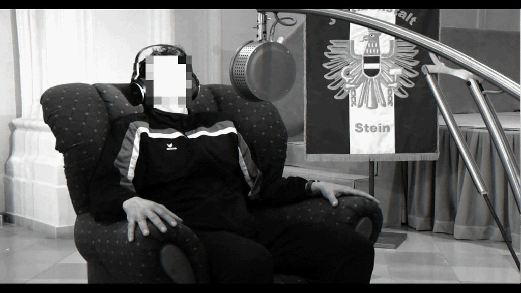 Santiago Sierra, Lucia and the Prisoners, black and white, sound, 12 min, 2014, courtesy of the artist and Prometeo Gallery di Ida Pisani, Milano/Lucca Santiago Sierra, Lucia and the Prisoners, black and white, sound, 12 min, 2014, courtesy of the artist and Prometeo Gallery di Ida Pisani, Milano/Lucca