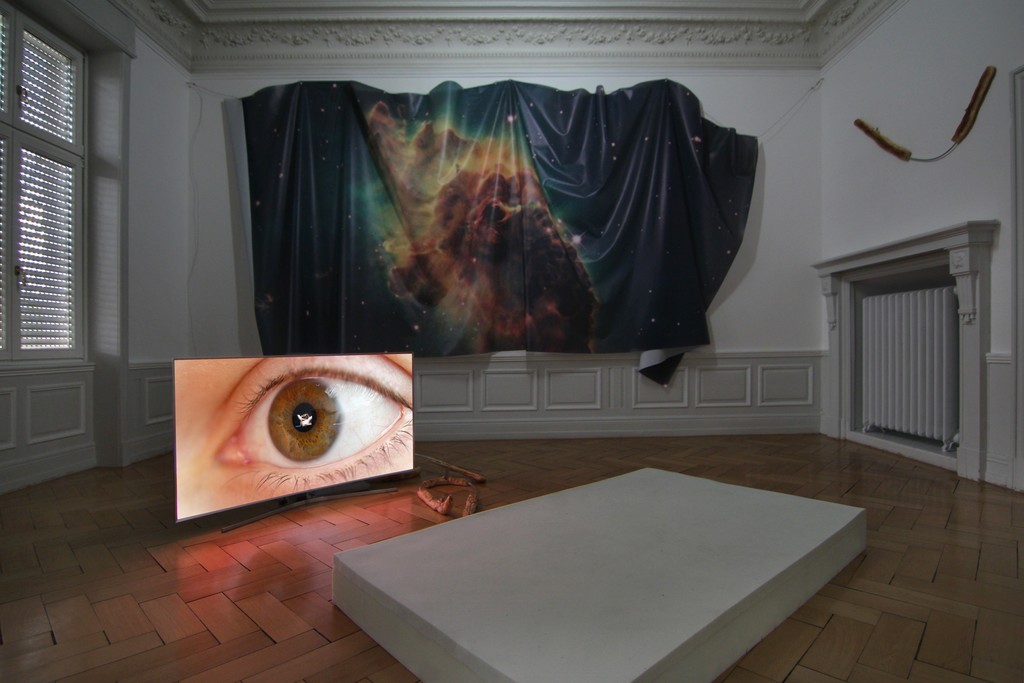 Installation View (from left to right):
Countdown Belladonna, Anna, 4k single channel video, 1:22h, 2016
Countdown Belladonna, Bread III, bread dough on custom shaped aluminum rod, 95 x 34cm, 2016 Countdown Belladonna, Bread IV, bread dough on custom shaped aluminum rod, 150 x 48cm, 2016 Countdown Belladonna, Nebula II (Carina Nebula), digital print on mesh, size variable, 2016 Countdown Belladonna, Bread V, bread dough on custom shaped aluminum rod, 118 x 101cm, 2016 Installation View (from left to right):
Countdown Belladonna, Anna, 4k single channel video, 1:22h, 2016
Countdown Belladonna, Bread III, bread dough on custom shaped aluminum rod, 95 x 34cm, 2016 Countdown Belladonna, Bread IV, bread dough on custom shaped aluminum rod, 150 x 48cm, 2016 Countdown Belladonna, Nebula II (Carina Nebula), digital print on mesh, size variable, 2016 Countdown Belladonna, Bread V, bread dough on custom shaped aluminum rod, 118 x 101cm, 2016