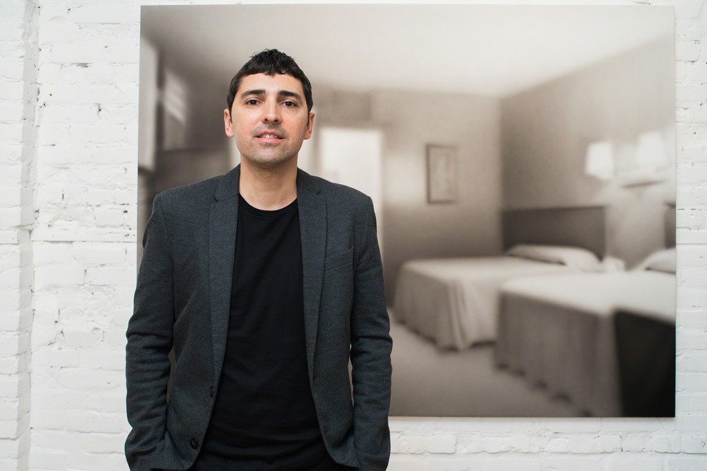 Artist Hugo Alonso front of his work in 2017 at Galerie Youn Artist Hugo Alonso front of his work in 2017 at Galerie Youn