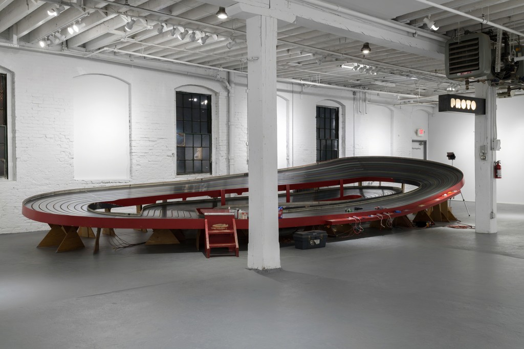 The slot car track installed at PROTO Gallery for NO FLEX RACE U. The slot car track installed at PROTO Gallery for NO FLEX RACE U.