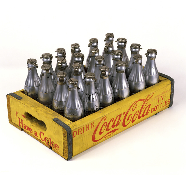 Andy Warhol, ‘You're In ’, 1967, Sculpture, Spray paint on glass bottles in printed wooden crate. Crate: 20.3 x 43.2 x 30.5 cm
Bottles (each): 20.3 x 5.7 cm
Diameter: 18.7 cm, National Gallery of Victoria