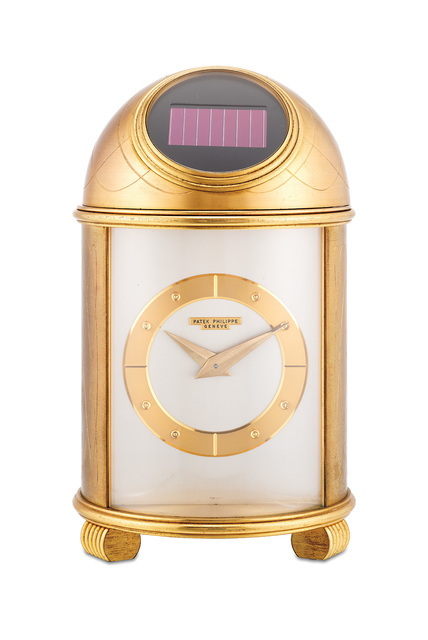 Patek Philippe, ‘A fine and rare engraved gilt brass solar powered dome clock with presentation inscription’, 1965, Design/Decorative Art, Gilt Brass, Phillips