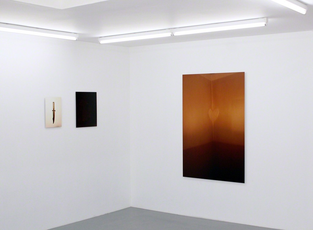 Installation view at Harlan Levey Projects - "Letter Opener (with bullet casings) c. 1945", 2015, C-Print, 41 x 27 cm, "Georgia (from the series Crackle & Drag)", 2015, C-Print, 51 x 42 cm and "Nicotine Heart", 2015, C-Print, 152 x 102 cm. Installation view at Harlan Levey Projects - "Letter Opener (with bullet casings) c. 1945", 2015, C-Print, 41 x 27 cm, "Georgia (from the series Crackle & Drag)", 2015, C-Print, 51 x 42 cm and "Nicotine Heart", 2015, C-Print, 152 x 102 cm.