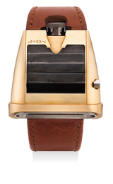 A rare and unusual pink gold, titanium and zirconium wristwatch with jump hour, international warranty and presentation box