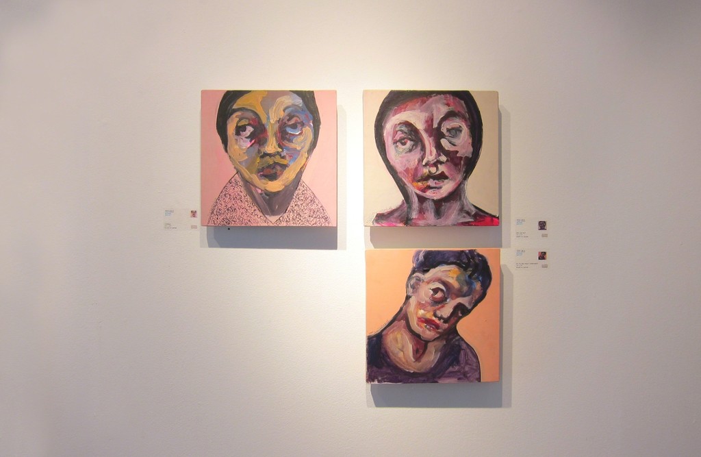 Three expressionist portraits float on the gallery wall, the faces become intimately familiar with the viewer as they take in the exhibition.
Clockwise from top left: Untitled, "Who Are You?," and "Do You See What's Underneath?" Three expressionist portraits float on the gallery wall, the faces become intimately familiar with the viewer as they take in the exhibition.
Clockwise from top left: Untitled, "Who Are You?," and "Do You See What's Underneath?"