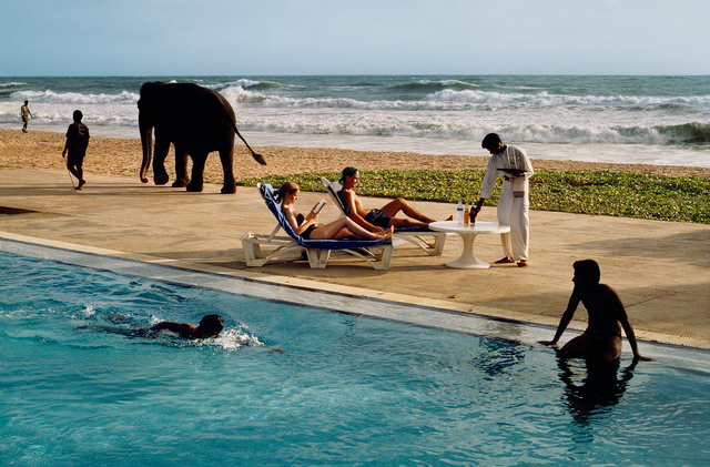 Steve McCurry, ‘Tourists lounge poolside, Sri Lanka’, 1995, Photography, Digital C-Prints printed on FujiFlex Crystal Archive Super Gloss Paper, Galeria de Babel