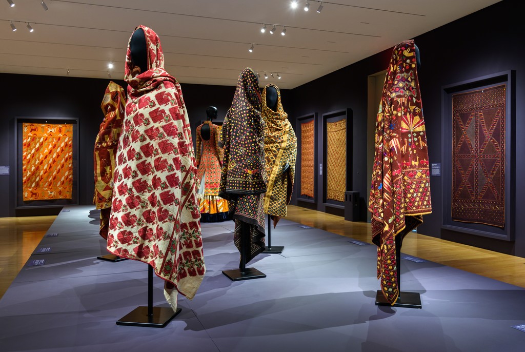 Installation Photograph of "Phulkari: The Embroidered Textiles of Punjab from the Jill and Sheldon Bonovitz Collection" Courtesy of the Philadelphia Museum of Art. Installation Photograph of "Phulkari: The Embroidered Textiles of Punjab from the Jill and Sheldon Bonovitz Collection" Courtesy of the Philadelphia Museum of Art.