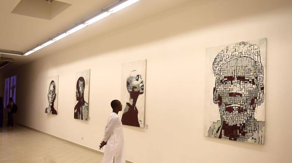 Installation view of pixilated portraits by Alimi Adewale. Installation view of pixilated portraits by Alimi Adewale.