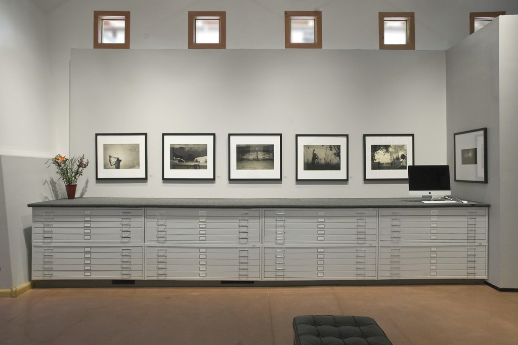 Images from Angela Bacon-Kidwell's Traveling Dream series installed about the flat files in photo-eye Gallery's main room. Images from Angela Bacon-Kidwell's Traveling Dream series installed about the flat files in photo-eye Gallery's main room.