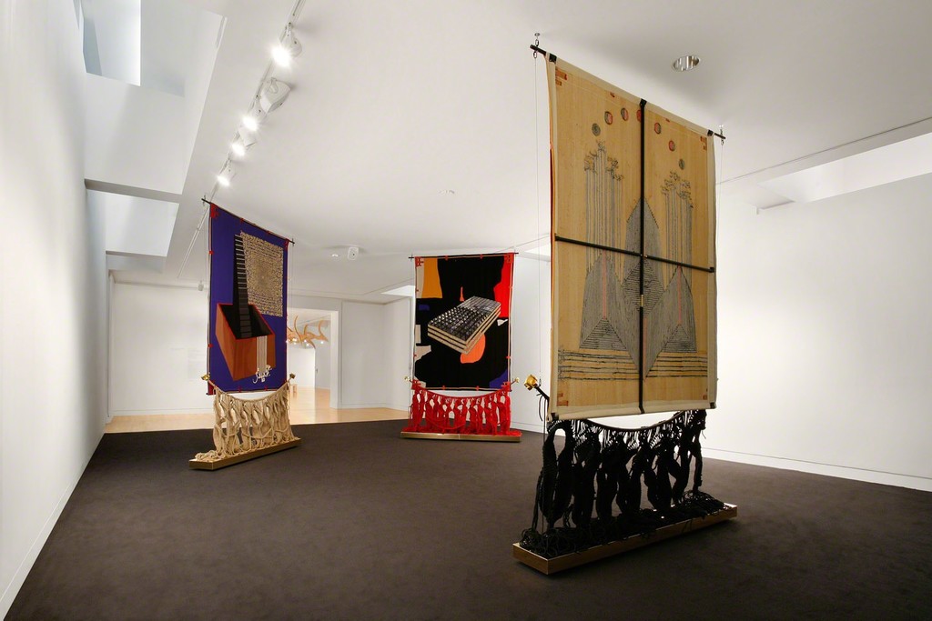 Shabazz Palaces with Nep Sidhu. SonicArchiTextile, 2015.
Malcolm’s Smile, 2015. Concept and design: Nep Sidhu. Wool, poly-cotton, aluminum. 150 x 96 x 15 in. Commissioned by the Frye Art Museum and funded by the Frye Foundation, Douglas Smith and Stephanie-Ellis Smith. Courtesy of the artist.
Photo: Mark Woods Shabazz Palaces with Nep Sidhu. SonicArchiTextile, 2015.
Malcolm’s Smile, 2015. Concept and design: Nep Sidhu. Wool, poly-cotton, aluminum. 150 x 96 x 15 in. Commissioned by the Frye Art Museum and funded by the Frye Foundation, Douglas Smith and Stephanie-Ellis Smith. Courtesy of the artist.
Photo: Mark Woods