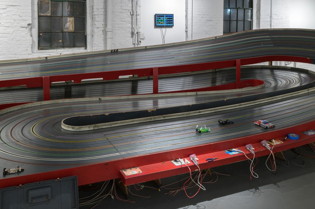 A detail of the driving area of the slot car track. A detail of the driving area of the slot car track.
