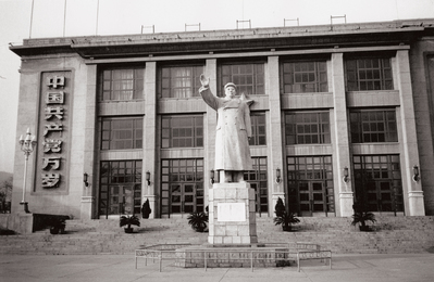 Statue of Mao and Building