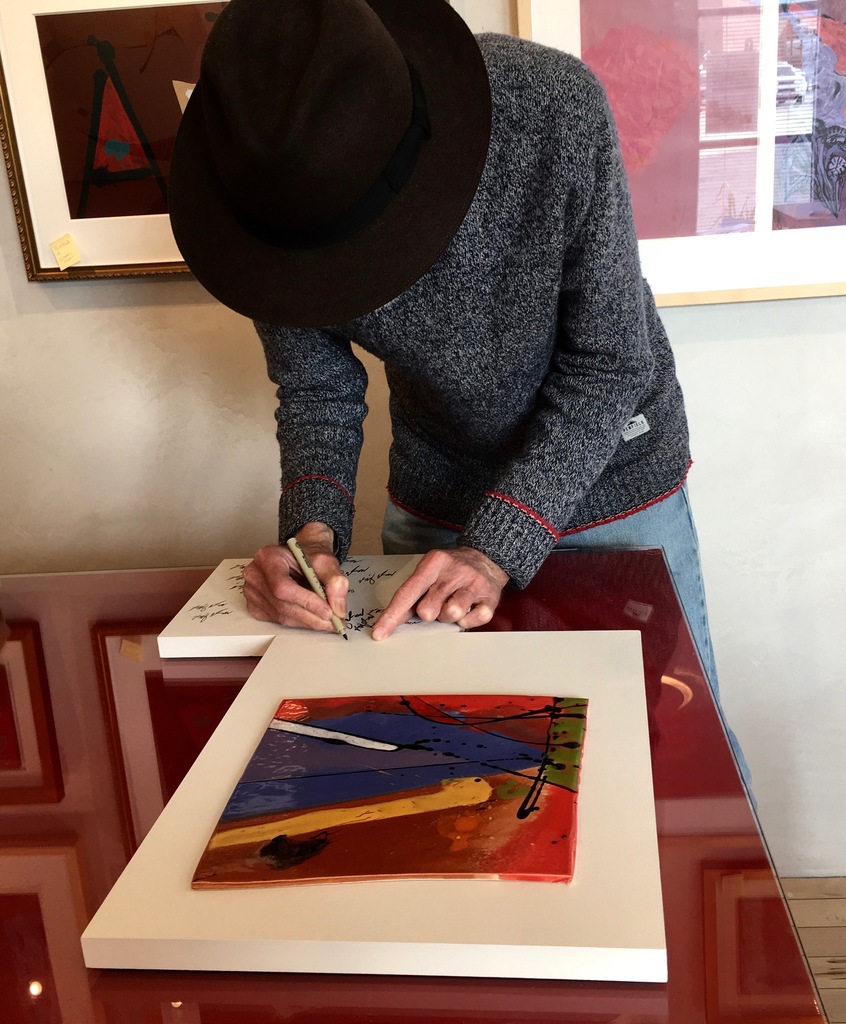 Artist Robert Bigelow signing the small ceramic murals at the gallery on September 20, 2018. Artist Robert Bigelow signing the small ceramic murals at the gallery on September 20, 2018.