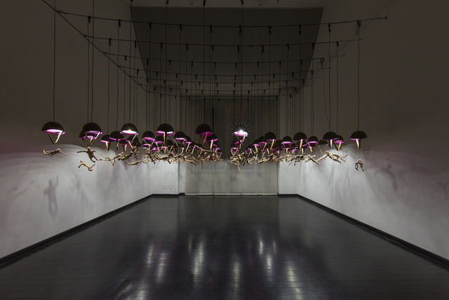 Oleg Kulik, ‘Parachutists’, 2019, Installation, Metal helmets, polymer clay, metal wires, electric wires, led lights, Giampaolo Abbondio