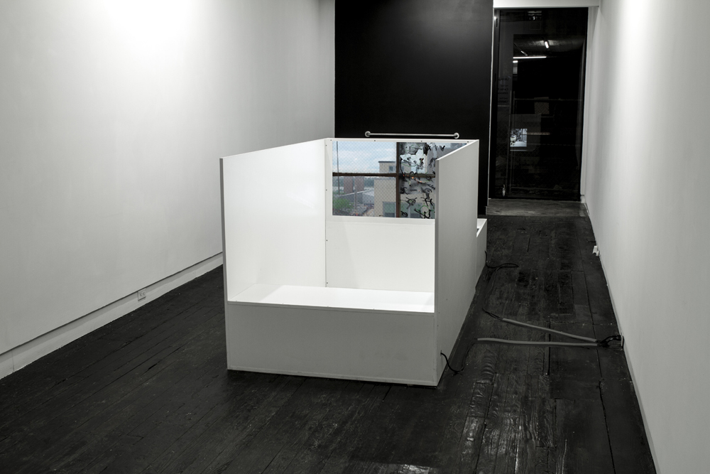 Installation view of "Delusion Through Details" at LMAKgallery
Work on view "Discern in Reverse", 2016
Press board, Formica, two video projections, 2 HD media players, 4 self-powered Yamaha speakers, 2 HD projectors, 2 grip bars, sound-proofing foam, tropical fresh air freshener
144 x 48 x 48 inches
Edition of 3, 1 AP Installation view of "Delusion Through Details" at LMAKgallery
Work on view "Discern in Reverse", 2016
Press board, Formica, two video projections, 2 HD media players, 4 self-powered Yamaha speakers, 2 HD projectors, 2 grip bars, sound-proofing foam, tropical fresh air freshener
144 x 48 x 48 inches
Edition of 3, 1 AP