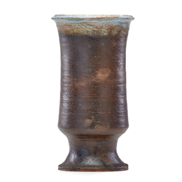 Tall footed vase